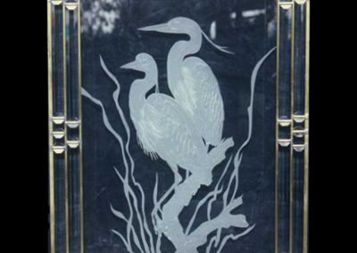Sand carved egrets in private residence